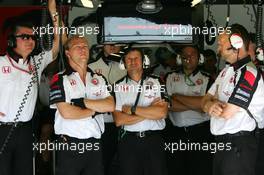 15.07.2006 Magny Cours, France,  Honda Racing mechanics watching the session on a TV screen - Formula 1 World Championship, Rd 11, French Grand Prix, Saturday Practice