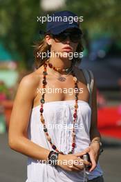 15.07.2006 Magny Cours, France,  A Girl in the paddock - Formula 1 World Championship, Rd 11, French Grand Prix, Saturday