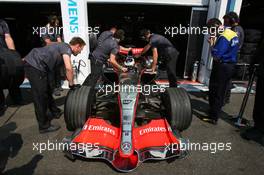 15.07.2006 Magny Cours, France,  Pedro de la Rosa (ESP), Team McLaren Mercedes, in the pitbox - Formula 1 World Championship, Rd 11, French Grand Prix, Saturday Practice