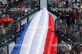 15.07.2006 Magny Cours, France,  An inflatable French flag at turn 17 - Formula 1 World Championship, Rd 11, French Grand Prix, Saturday Qualifying