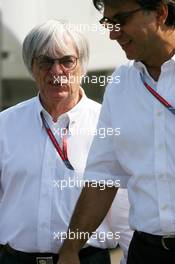 16.07.2006 Magny Cours, France,  Bernie Ecclestone (GBR), CEO of Formula One Management (FOM) and Pasquale Lattuneddu (ITA), Chief Operations FOM - Formula 1 World Championship, Rd 11, French Grand Prix, Sunday