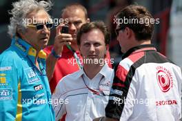 16.07.2006 Magny Cours, France,  Flavio Briatore (ITA), Renault F1 Team, Team Chief, Managing Director, Christian Horner (GBR), Red Bull Racing, Sporting Director and Gil de Ferran (BRA), Honda Racing F1 Team,  Sporting Director - Formula 1 World Championship, Rd 11, French Grand Prix, Sunday