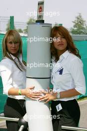 16.07.2006 Magny Cours, France,  Hot security girls at the gate - Formula 1 World Championship, Rd 11, French Grand Prix, Sunday