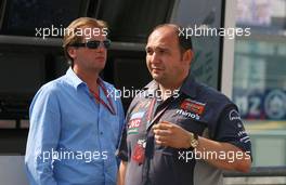 16.07.2006 Magny Cours, France,  Michiel Mol (NDL) Who is said to be the purchaser of Midland MF1 Racing,with Colin Kolles (GER), Midland MF1 Racing, Managing Director - Formula 1 World Championship, Rd 11, French Grand Prix, Sunday