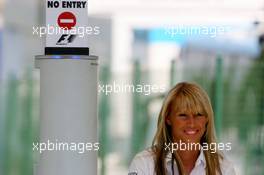 16.07.2006 Magny Cours, France,  Hot security girl at the gate - Formula 1 World Championship, Rd 11, French Grand Prix, Sunday