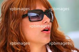 16.07.2006 Magny Cours, France,  Security girl at the gate - Formula 1 World Championship, Rd 11, French Grand Prix, Sunday