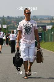 13.07.2006 Magny Cours, France,  Michael Schumacher (GER), Scuderia Ferrari arrives at the circuit - Formula 1 World Championship, Rd 11, French Grand Prix, Thursday