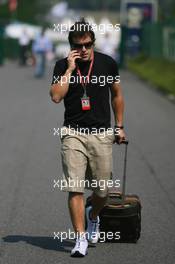 13.07.2006 Magny Cours, France,  Fernando Alonso (ESP), Renault F1 Team, arrives at the circuit - Formula 1 World Championship, Rd 11, French Grand Prix, Thursday