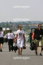 13.07.2006 Magny Cours, France,  Michael Schumacher (GER), Scuderia Ferrari arrives at the circuit - Formula 1 World Championship, Rd 11, French Grand Prix, Thursday