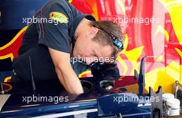 13.07.2006 Magny Cours, France,  Red Bull Racing mechanics prepare their cars for the weekend - Formula 1 World Championship, Rd 11, French Grand Prix, Thursday