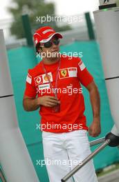 13.07.2006 Magny Cours, France,  Felipe Massa (BRA), Scuderia Ferrari, Portrait, coming through the security gates - Formula 1 World Championship, Rd 11, French Grand Prix, Thursday