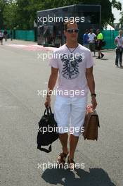 13.07.2006 Magny Cours, France,  Michael Schumacher (GER), Scuderia Ferrari arrives at the circuit - Formula 1 World Championship, Rd 11, French Grand Prix, Thursday