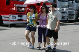 13.07.2006 Magny Cours, France,  Japanese tourists in the paddock - Formula 1 World Championship, Rd 11, French Grand Prix, Thursday