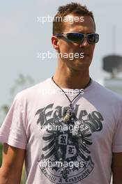 13.07.2006 Magny Cours, France,  Michael Schumacher (GER), Scuderia Ferrari arrives at the circuit - Formula 1 World Championship, Rd 11, French Grand Prix, Thursday