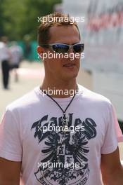 13.07.2006 Magny Cours, France,  Michael Schumacher (GER), Scuderia Ferrari arrives at the circuit - Formula 1 World Championship, Rd 11, French Grand Prix, Thursday