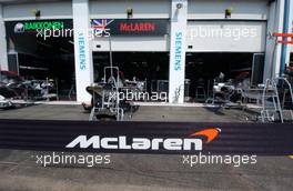 13.07.2006 Magny Cours, France,  McLaren pitboxes without the name of Montoya. The sign for De la Rosa was not finished yet - Formula 1 World Championship, Rd 11, French Grand Prix, Thursday