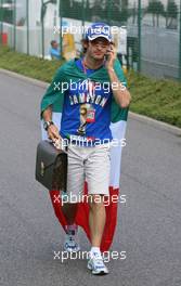 13.07.2006 Magny Cours, France,  Jarno Trulli (ITA), Toyota Racing, still celebrating Italy's World Cup win - Formula 1 World Championship, Rd 11, French Grand Prix, Thursday