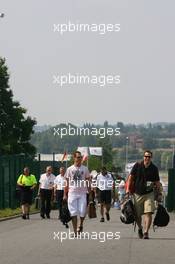 13.07.2006 Magny Cours, France,  Michael Schumacher (GER), Scuderia Ferrari arrives at the circuit - Formula 1 World Championship, Rd 11, French Grand Prix, Thursday