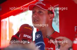 13.07.2006 Magny Cours, France,  Michael Schumacher (GER), Scuderia Ferrari, Portrait, talking with the press - Formula 1 World Championship, Rd 11, French Grand Prix, Thursday