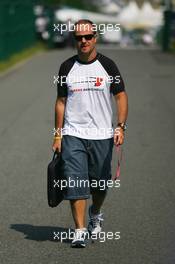 13.07.2006 Magny Cours, France,  Rubens Barrichello (BRA), Honda Racing F1 Team, arrives at the circuit - Formula 1 World Championship, Rd 11, French Grand Prix, Thursday