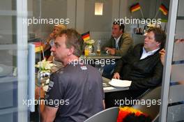 09.06.2006 Silverstone, England,  Norbert Haug (GER), Mercedes, Motorsport chief watches Germany play football - Formula 1 World Championship, Rd 8, British Grand Prix, Friday