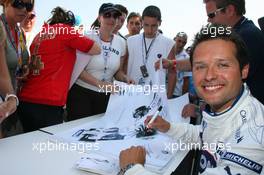 09.06.2006 Silverstone, England,  Andy Priaulx, GBR signs autographs in the BMW Pit Lane Theme Park - Formula 1 World Championship, Rd 8, British Grand Prix, Friday Practice