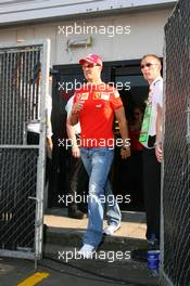 09.06.2006 Silverstone, England,  Michael Schumacher (GER), Scuderia Ferrari leaving drivers briefing - Formula 1 World Championship, Rd 8, British Grand Prix, Friday Practice