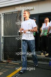 09.06.2006 Silverstone, England,  David Coulthard (GBR), Red Bull Racing leaving drivers briefing - Formula 1 World Championship, Rd 8, British Grand Prix, Friday Practice