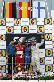 11.06.2006 Silverstone, England,  1st place Fernando Alonso (ESP), Renault F1 Team, 2nd Michael Schumacher (GER), Scuderia Ferrari and 3rd Kimi Raikkonen (FIN), Räikkönen, McLaren Mercedes - Formula 1 World Championship, Rd 8, British Grand Prix, Sunday Podium