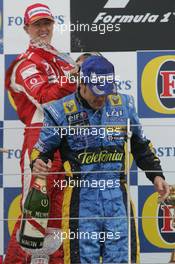 11.06.2006 Silverstone, England,  Michael Schumacher (GER), Scuderia Ferrari and Fernando Alonso (ESP), Renault F1 Team - Formula 1 World Championship, Rd 8, British Grand Prix, Sunday Podium