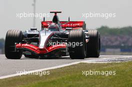 10.06.2006 Silverstone, England,  Kimi Raikkonen (FIN), Räikkönen, McLaren Mercedes, MP4-21 - Formula 1 World Championship, Rd 8, British Grand Prix, Saturday Qualifying