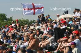 10.06.2006 Silverstone, England,  Fans watch from trackside - Formula 1 World Championship, Rd 8, British Grand Prix, Saturday Practice