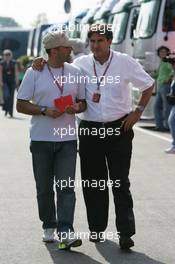 08.06.2006 Silverstone, England,  Ivan Capelli, F1 commentator on Italian TV station Rai Uno with Pasquale Lattuneddu (ITA) - Formula 1 World Championship, Rd 8, British Grand Prix, Thursday