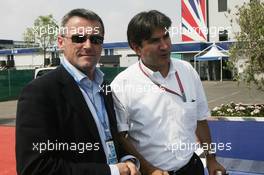 08.06.2006 Silverstone, England,  Marcello Lotti, General Manager of KSO (WTCC) with Pasquale Lattuneddu (ITA), Chief Operations FOM - Formula 1 World Championship, Rd 8, British Grand Prix, Thursday