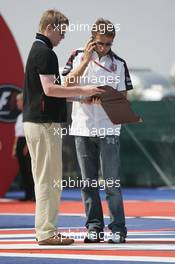 08.06.2006 Silverstone, England,  Jenson Button (GBR), Honda Racing F1 Team, signs autographs for fans - Formula 1 World Championship, Rd 8, British Grand Prix, Thursday