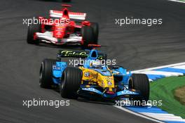 28.07.2006 Hockenheim, Germany,  Fernando Alonso (ESP), Renault F1 Team R26, leads Michael Schumacher (GER), Scuderia Ferrari 248 F1 - Formula 1 World Championship, Rd 12, German Grand Prix, Friday Practice