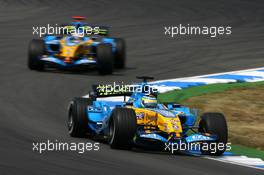 28.07.2006 Hockenheim, Germany,  Giancarlo Fisichella (ITA), Renault F1 Team R26, leads Fernando Alonso (ESP), Renault F1 Team R26 - Formula 1 World Championship, Rd 12, German Grand Prix, Friday Practice