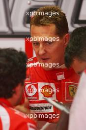 28.07.2006 Hockenheim, Germany,  Michael Schumacher (GER), Scuderia Ferrari, talks with Ferrari and Bridgestone engineers - Formula 1 World Championship, Rd 12, German Grand Prix, Friday Practice