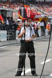 28.07.2006 Hockenheim, Germany,  Honda Racing F1 Team member with a pitstop sign - Formula 1 World Championship, Rd 12, German Grand Prix, Friday Practice