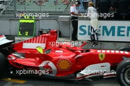 28.07.2006 Hockenheim, Germany,  Michael Schumacher (GER), Scuderia Ferrari is passing Nico Rosberg (GER), WilliamsF1 Team - Formula 1 World Championship, Rd 12, German Grand Prix, Friday Practice