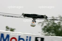 28.07.2006 Hockenheim, Germany,  TV camera flying through the whole motodrome to give thr viewer a picture of driving with the cars - Formula 1 World Championship, Rd 12, German Grand Prix, Friday