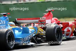 28.07.2006 Hockenheim, Germany,  Fernando Alonso (ESP), Renault F1 Team, R26 and Michael Schumacher (GER), Scuderia Ferrari, 248 F1 - Formula 1 World Championship, Rd 12, German Grand Prix, Friday Practice