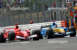 28.07.2006 Hockenheim, Germany,  Michael Schumacher (GER), Scuderia Ferrari, 248 F1 and Fernando Alonso (ESP), Renault F1 Team, R26 - Formula 1 World Championship, Rd 12, German Grand Prix, Friday Practice