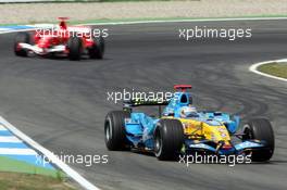 28.07.2006 Hockenheim, Germany,  Fernando Alonso (ESP), Renault F1 Team and Michael Schumacher (GER), Scuderia Ferrari - Formula 1 World Championship, Rd 12, German Grand Prix, Friday Practice