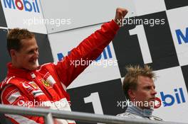 30.07.2006 Hockenheim, Germany,  Michael Schumacher (GER), Scuderia Ferrari 1st place and 3rd place Kimi Raikkonen (FIN), Räikkönen, McLaren Mercedes - Formula 1 World Championship, Rd 12, German Grand Prix, Sunday Podium