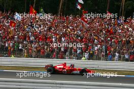 30.07.2006 Hockenheim, Germany,  Fans cheering for Michael Schumacher (GER), Scuderia Ferrari 248 F1 - Formula 1 World Championship, Rd 12, German Grand Prix, Sunday Podium