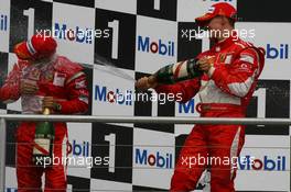 30.07.2006 Hockenheim, Germany,  2nd place Felipe Massa (BRA), Scuderia Ferrari and 1st place Michael Schumacher (GER), Scuderia Ferrari - Formula 1 World Championship, Rd 12, German Grand Prix, Sunday Podium