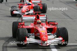 30.07.2006 Hockenheim, Germany,  Michael Schumacher (GER), Scuderia Ferrari and 2nd place Felipe Massa (BRA), Scuderia Ferrari - Formula 1 World Championship, Rd 12, German Grand Prix, Sunday Podium