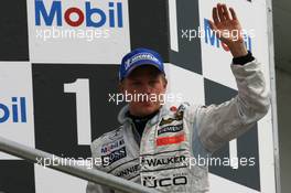 30.07.2006 Hockenheim, Germany,  3rd place Kimi Raikkonen (FIN), Räikkönen, McLaren Mercedes Extinguishes his engine - Formula 1 World Championship, Rd 12, German Grand Prix, Sunday Podium