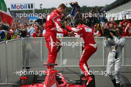 30.07.2006 Hockenheim, Germany,  Michael Schumacher (GER), Scuderia Ferrari and Felipe Massa (BRA), Scuderia Ferrari - Formula 1 World Championship, Rd 12, German Grand Prix, Sunday Podium